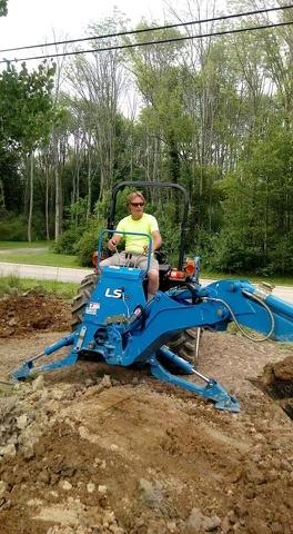 charles using backhoe charles using backhoe